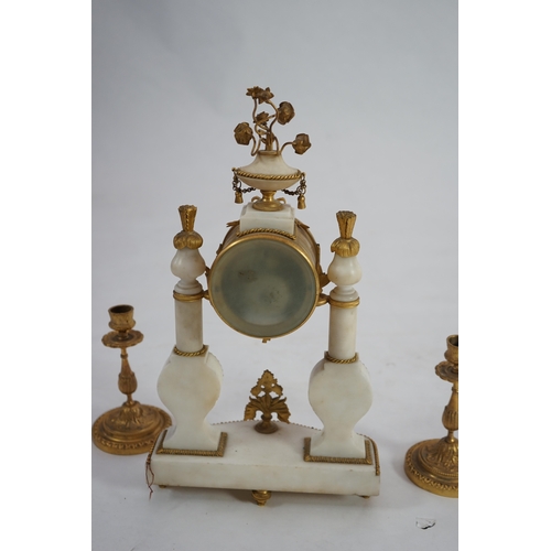 1358 - An early 20th century French ormolu mounted white mounted portico clock with flowering urn surmount ... 