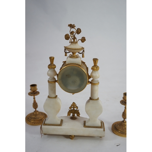 1358 - An early 20th century French ormolu mounted white mounted portico clock with flowering urn surmount ... 