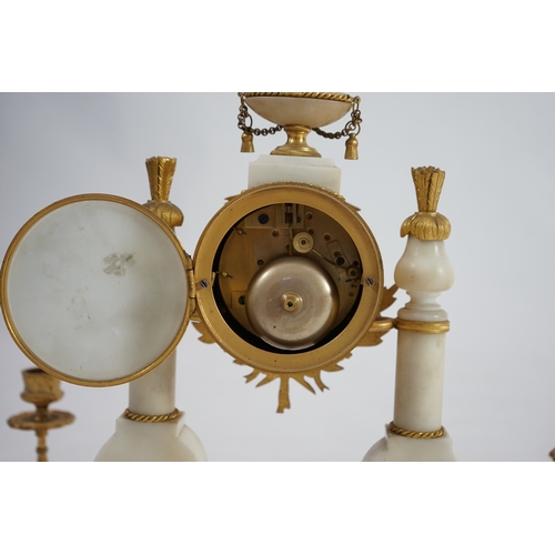 1358 - An early 20th century French ormolu mounted white mounted portico clock with flowering urn surmount ... 