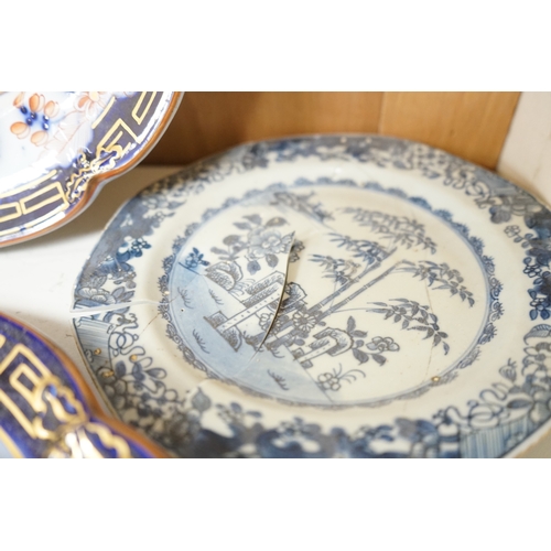 1360 - A Staffordshire flow blue ironstone part dinner service, comprising twenty-two 26.5cm diameter plate... 