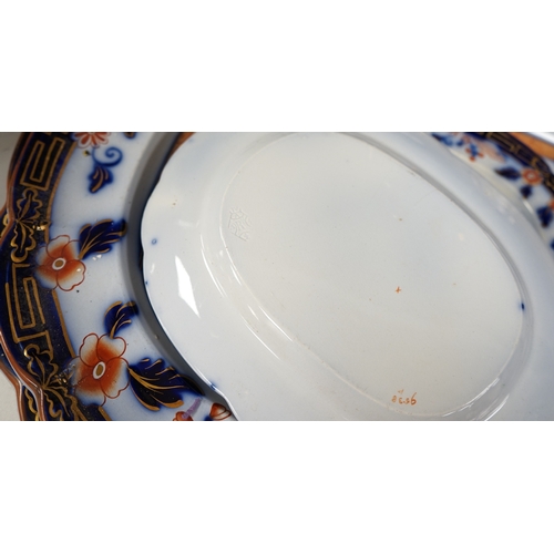 1360 - A Staffordshire flow blue ironstone part dinner service, comprising twenty-two 26.5cm diameter plate... 