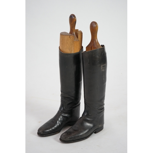 1361 - A pair of mens black leather riding boots with wooden trees, 45cm high. Condition - fair need polish... 