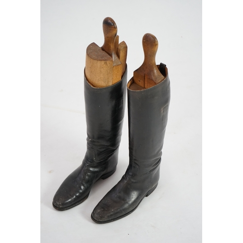 1361 - A pair of mens black leather riding boots with wooden trees, 45cm high. Condition - fair need polish... 