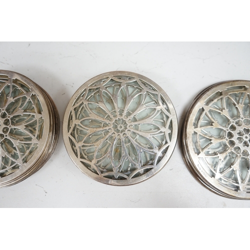 1363 - A group of ten silver overlaid glass circular place mats, 15cm diameter. Condition - good