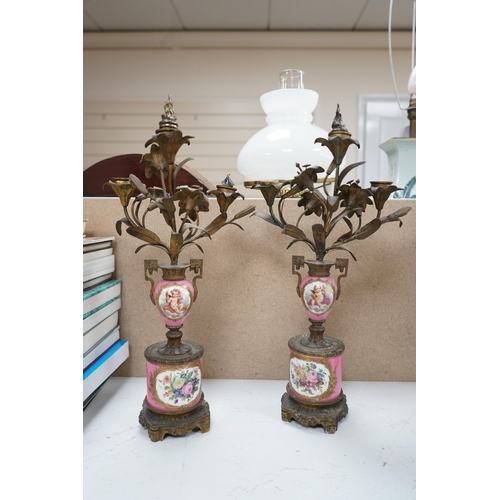 1391 - A pair of French porcelain mounted gilt metal candelabra and one other pair, tallest 45cm. Condition... 