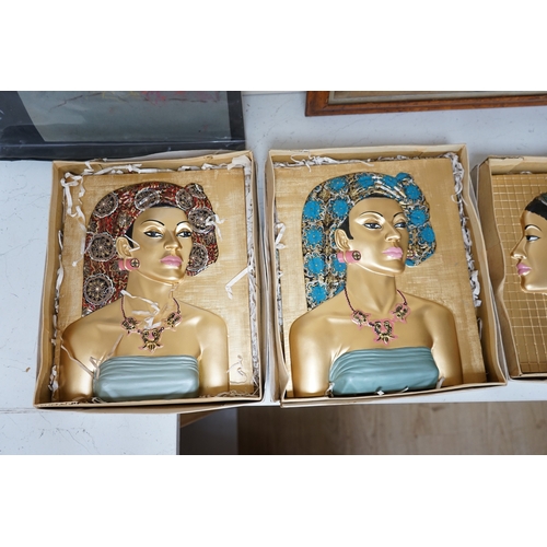 1395 - Five moulded and hand painted plaster plaques, busts of women, in original boxes, 35cm high. Conditi... 