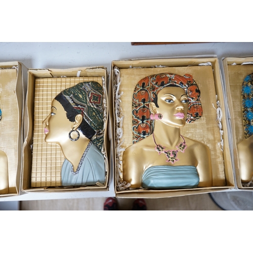 1395 - Five moulded and hand painted plaster plaques, busts of women, in original boxes, 35cm high. Conditi... 