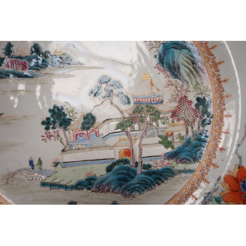 1397 - A Chinese famille rose landscape dish, Qianlong, 38.5cm, another dish with floral decoration, 38.5... 