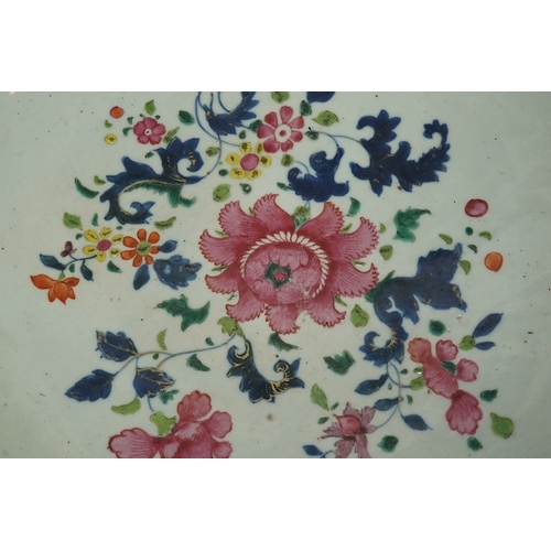 1402 - A large Chinese famille rose punch bowl, Qianlong period, the exterior painted with flowers in a fen... 