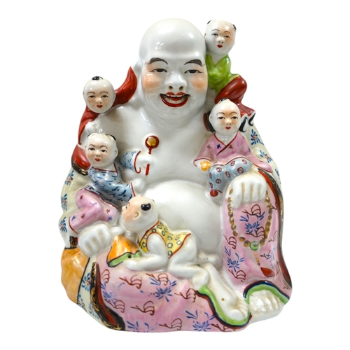 1406 - A Chinese enamelled porcelain Budai group, 20cm. Condition - good