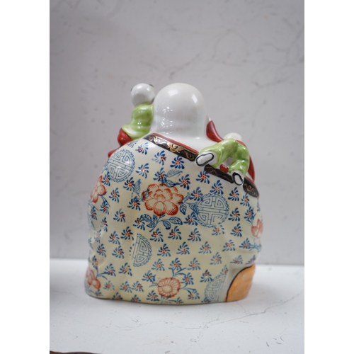 1406 - A Chinese enamelled porcelain Budai group, 20cm. Condition - good