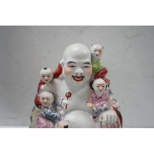 1406 - A Chinese enamelled porcelain Budai group, 20cm. Condition - good