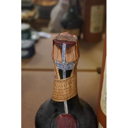 1435 - One bottle of Dom benedictine together with a bottle BOLS. Condition - fair, storage history unknown... 