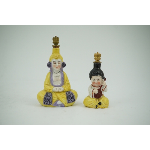 1439 - Two Continental porcelain figural scent bottles with gilt stoppers, largest 9cm high. Condition - go... 