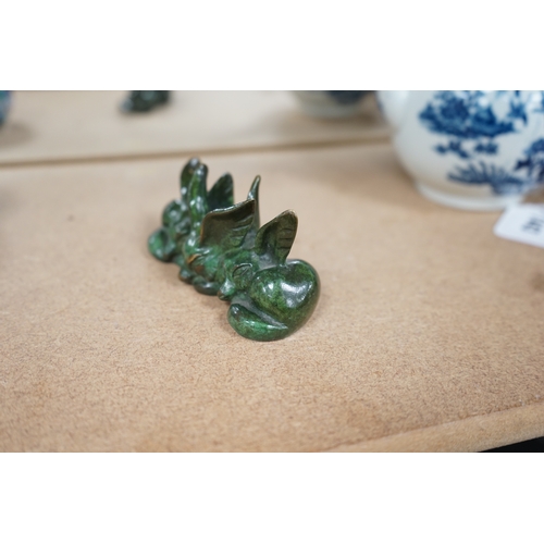 1442 - Raoh Schorr (1901-1991) A green patinated bronze group of three seated foxes signed Schorr, 11.5cm w... 