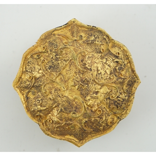 1445 - 'An 18th century Chinese gilt repousee box & cover, probable Liao Dynasty', of petal lobed form, dec... 