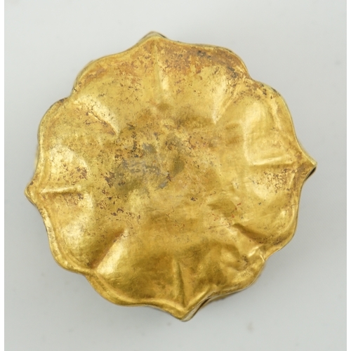 1445 - 'An 18th century Chinese gilt repousee box & cover, probable Liao Dynasty', of petal lobed form, dec... 