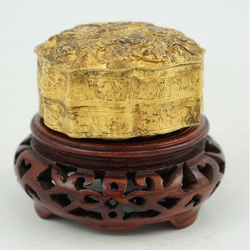 1445 - 'An 18th century Chinese gilt repousee box & cover, probable Liao Dynasty', of petal lobed form, dec... 