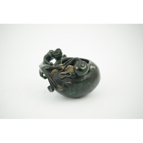 1451 - A Chinese dragon carved green hardstone brushwasher, 5cm high. Condition - good