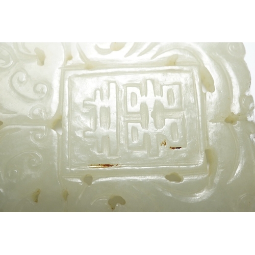 1455 - A Chinese white jade Shuangxi plaque, 19th/20th century, carved in a low relief, 7.3cm longProvena... 