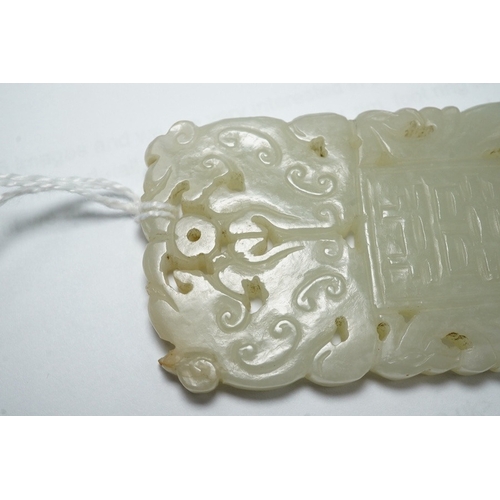 1455 - A Chinese white jade Shuangxi plaque, 19th/20th century, carved in a low relief, 7.3cm longProvena... 