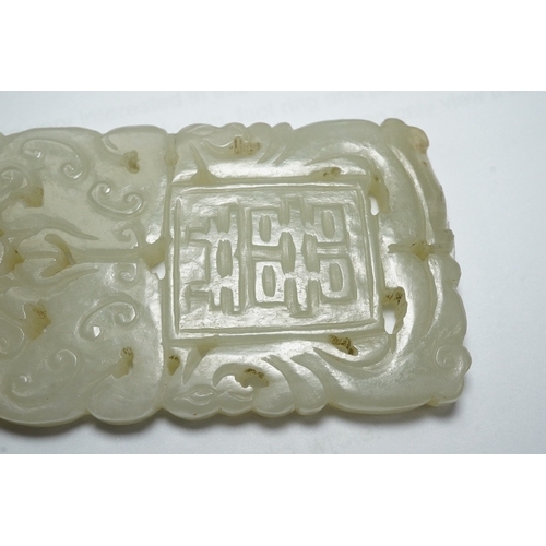 1455 - A Chinese white jade Shuangxi plaque, 19th/20th century, carved in a low relief, 7.3cm longProvena... 