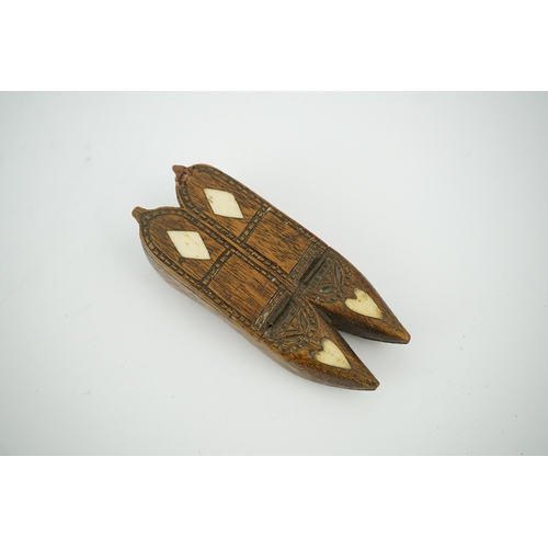 1464 - An early 19th century bone inset carved wood 'pair of shoes' snuff box with damaged sprung lid, 9.5c... 