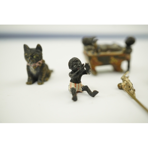 1467 - Four novelty miniature cold painted bronzes; black boy with cradle, black baby, cat and pig and a si... 