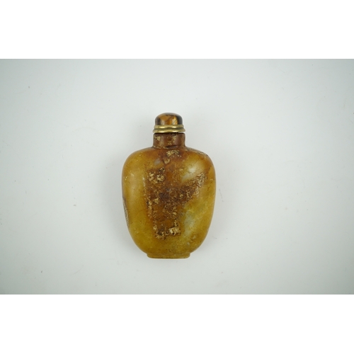 1472 - A Chinese soapstone snuff bottle with tiger's eye stopper, 8cm high. Condition - fair