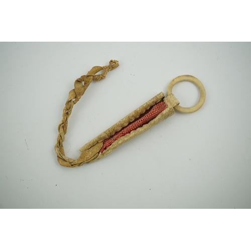 1476 - A Sami carved reindeer antler needle case, 10cm high.Condition - good