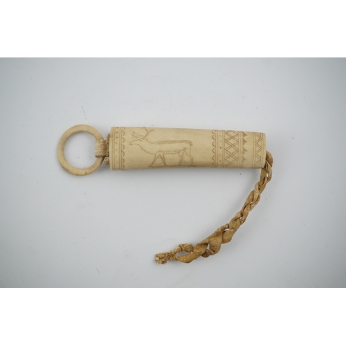 1476 - A Sami carved reindeer antler needle case, 10cm high.Condition - good