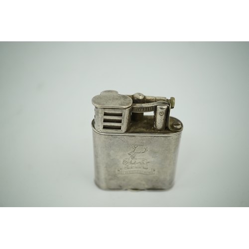 1482 - An Edwardian Dunhill cigarette lighter with unmarked crested white metal banding and patent no.28880... 