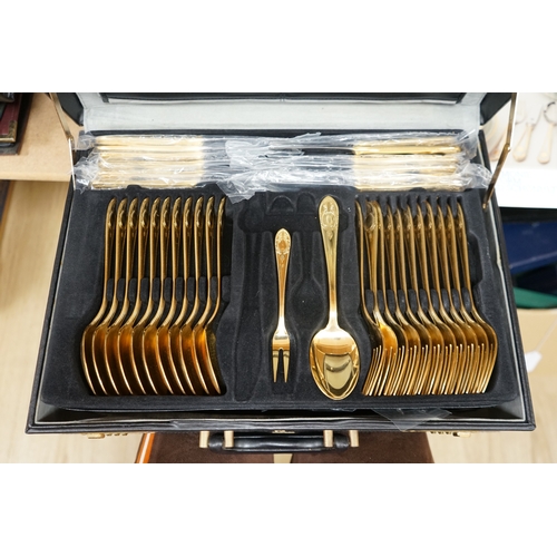 1485 - A Bestecke gold plated canteen of cutlery. Condition - good