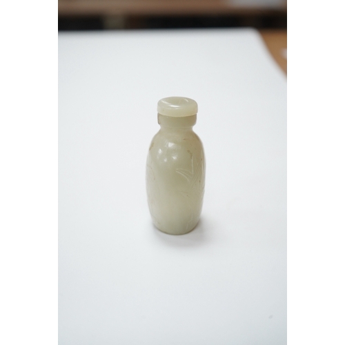 1495 - A Chinese carved jade snuff bottle with stopper, 7cm high including stopper. Condition - good