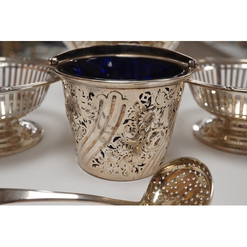 1833 - A George III small silver sugar basket, London, 1810, with blue glass liner, 57mm, a George III silv... 