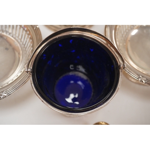 1833 - A George III small silver sugar basket, London, 1810, with blue glass liner, 57mm, a George III silv... 