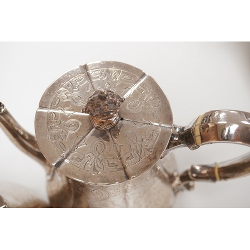 1834 - A Victorian engraved silver teapot and matching coffee pot, by George Ivory, London, 1857, gross wei... 