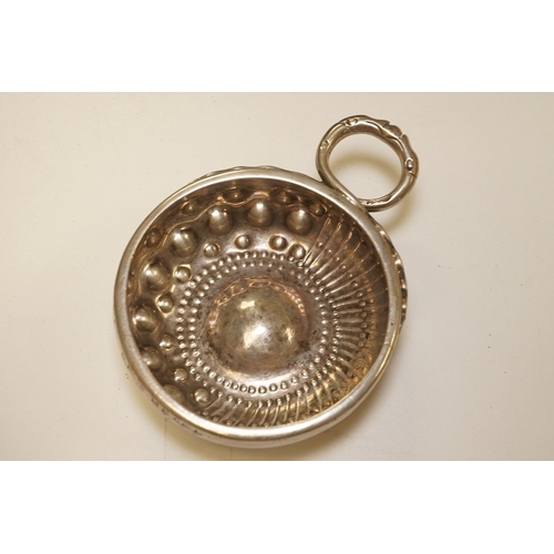 1836 - A French 800 standard white metal taste vin, 11cm, together with a George III silver toddy ladle, Lo... 