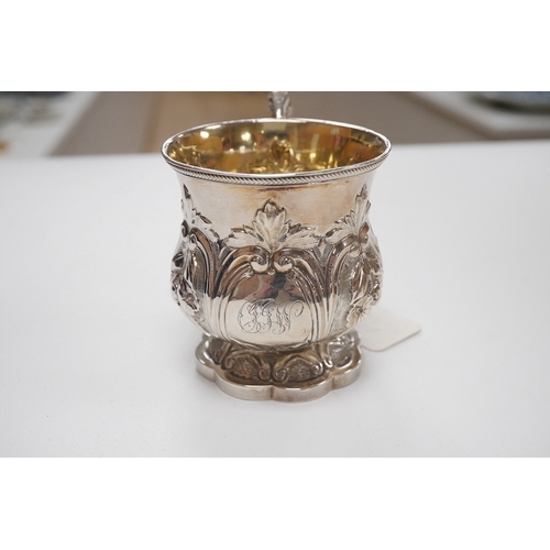 1858 - A cased William IV embossed silver pedestal christening mug, with engraved monogram, by Pearce & Bur... 