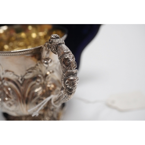 1858 - A cased William IV embossed silver pedestal christening mug, with engraved monogram, by Pearce & Bur... 