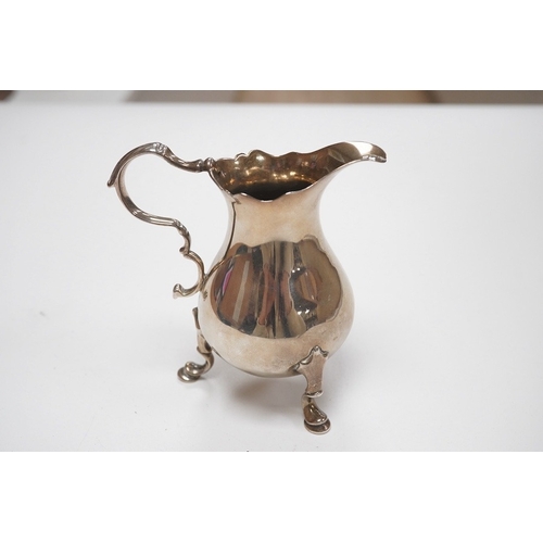 1859 - A mid 18th century silver cream jug, indistinct marks, 92mm, 3.3oz. Condition - fair