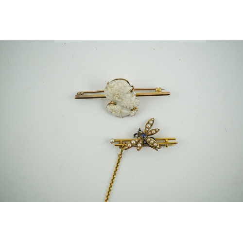 1918 - An Edwardian 15ct mounted cameo shell bar brooch, 49mm, together with a yellow metal, sapphire and s... 