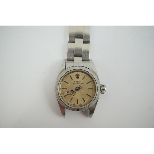 100 - A lady's 1990's stainless steel Rolex Oyster Perpetual wrist watch, on a stainless steel Rolex brace... 