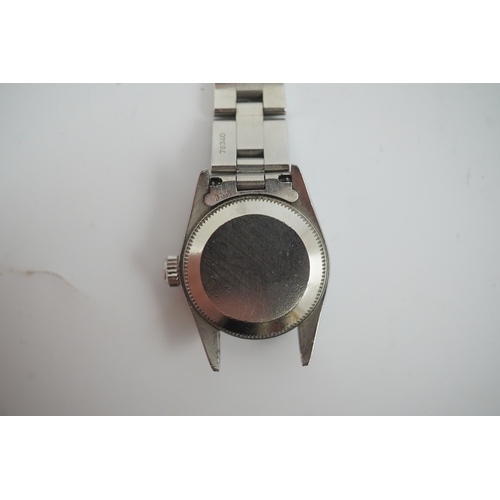 100 - A lady's 1990's stainless steel Rolex Oyster Perpetual wrist watch, on a stainless steel Rolex brace... 