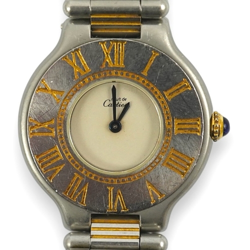 102 - A lady's steel and gold plated Must De Cartier quartz wrist watch, on a steel and gold plated Must D... 