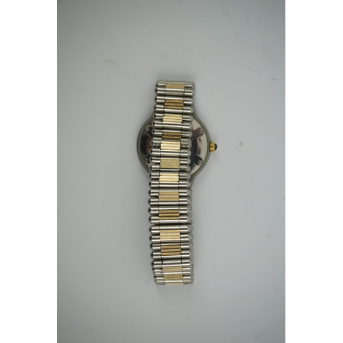 102 - A lady's steel and gold plated Must De Cartier quartz wrist watch, on a steel and gold plated Must D... 