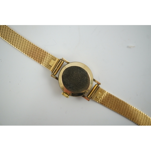 105 - A lady's modern gold Longines manual wind wrist watch, on an Italian 18k gold bracelet, overall 16.5... 