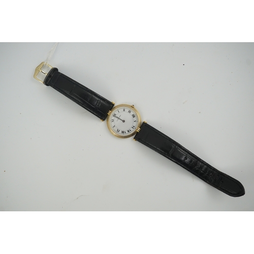 107 - A modern 18ct gold Cartier Vendome quartz wrist watch, on an associated leather strap, with Roman di... 