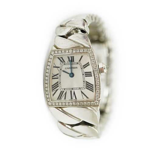 110 - A lady's recent 18ct white gold and diamond set Cartier La Dona quartz wrist watch, on an 18ct white... 