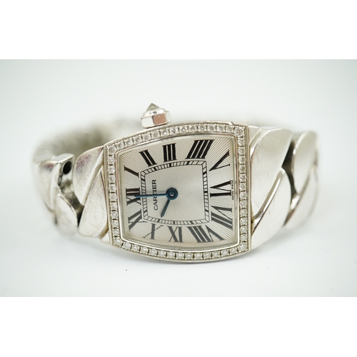 110 - A lady's recent 18ct white gold and diamond set Cartier La Dona quartz wrist watch, on an 18ct white... 